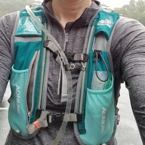 TRIWONDER Running Vest Hydration Pack Backpack for Men & Women, Lightweight Trail Marathon Run Race Vest for Cycling Jogging - color: 01 Light Blue - With a 500ml Water Bottle